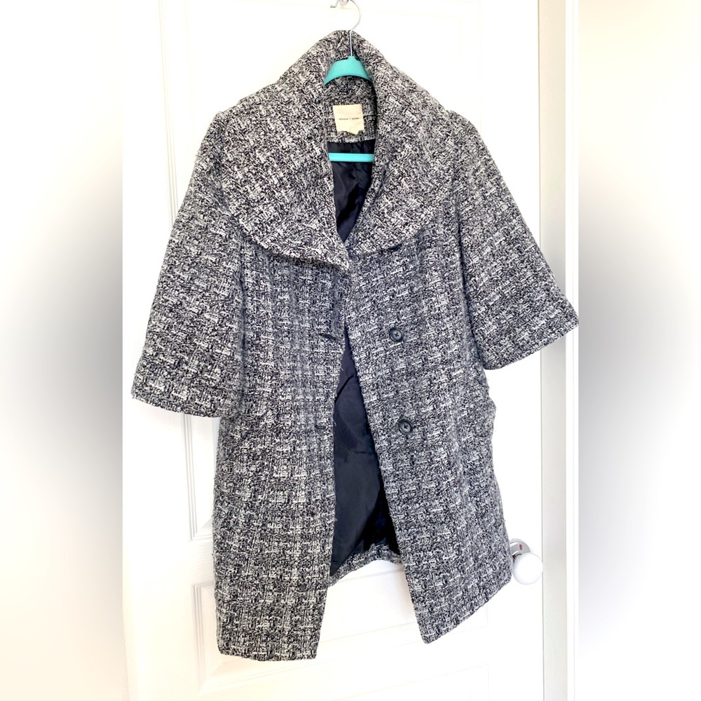 Stylish and warm with half long sleeve.